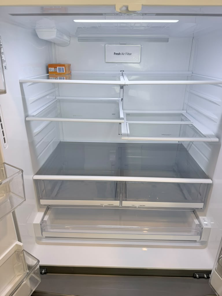 Clean refrigerator shelves and drawers — Madeline’s Cleaners